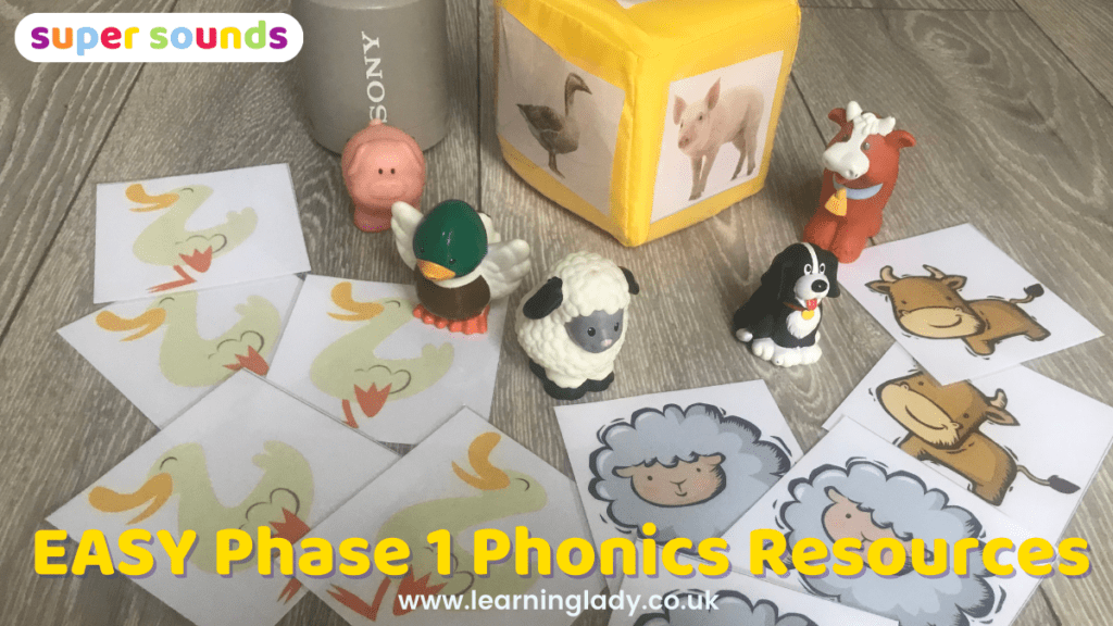 a range of phase 1 phonics resources including farm animal toys and picture cards is pictured