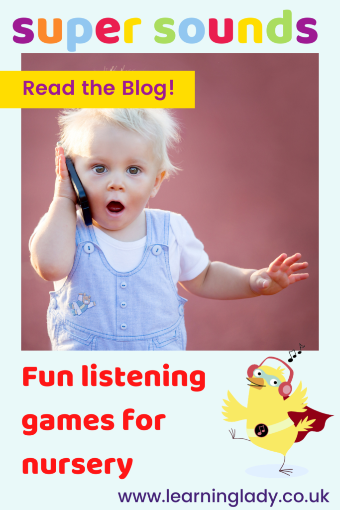 A toddler is pictured chatting on a phone ready to play Listening games