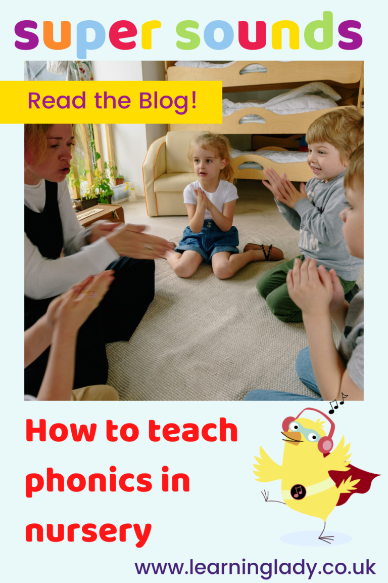 A nursery teacher sits on the mat with a group of children sitting and joining in with a game as she demonstrates how to teach phonics in nursery.