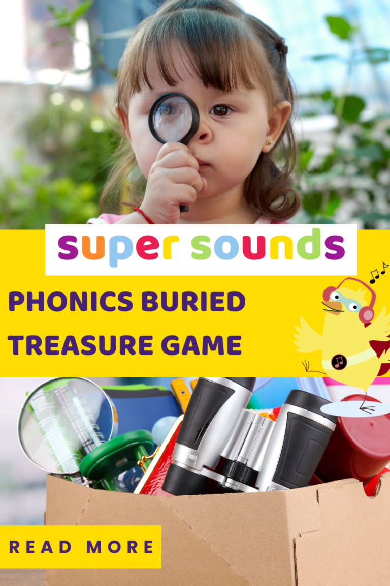 Phonics buried treasure game. Child with magnifying glass and a box of objects